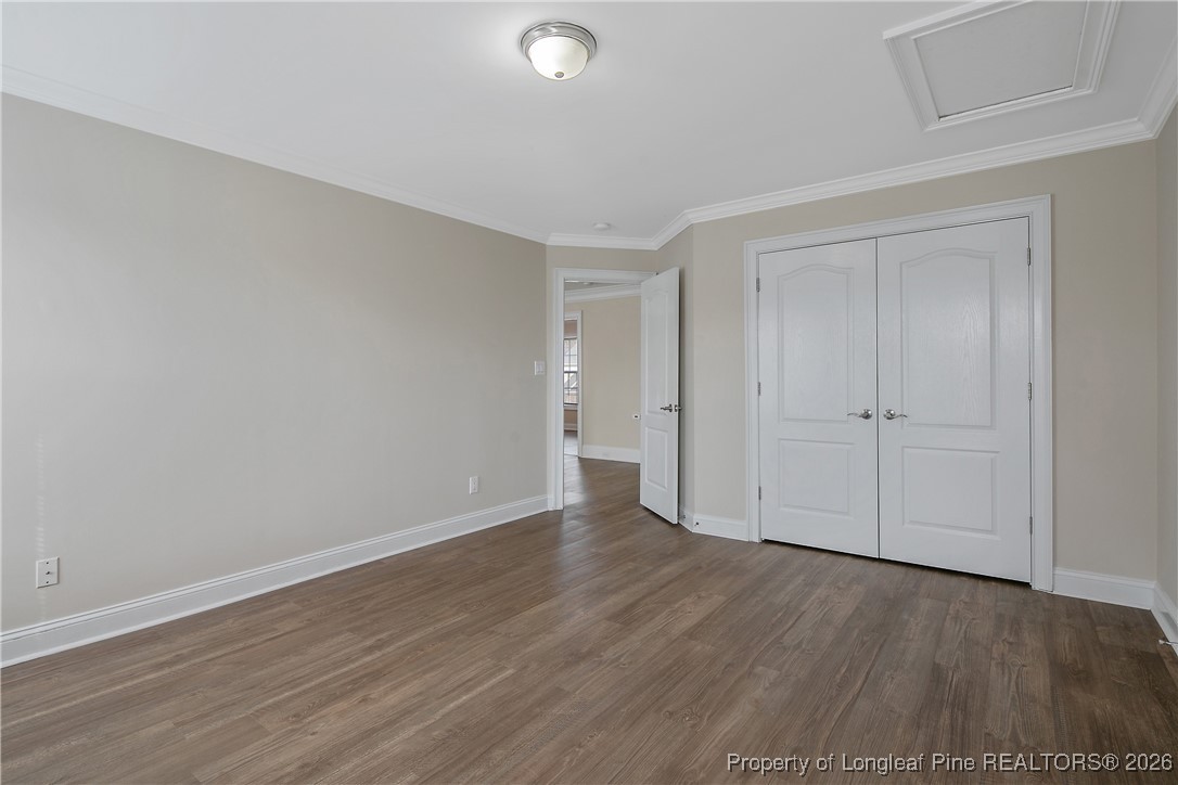 2721 Plum Ridge Road Fayetteville, NC 28306 - Photo 44 of 50 a view of an empty room and wooden floor