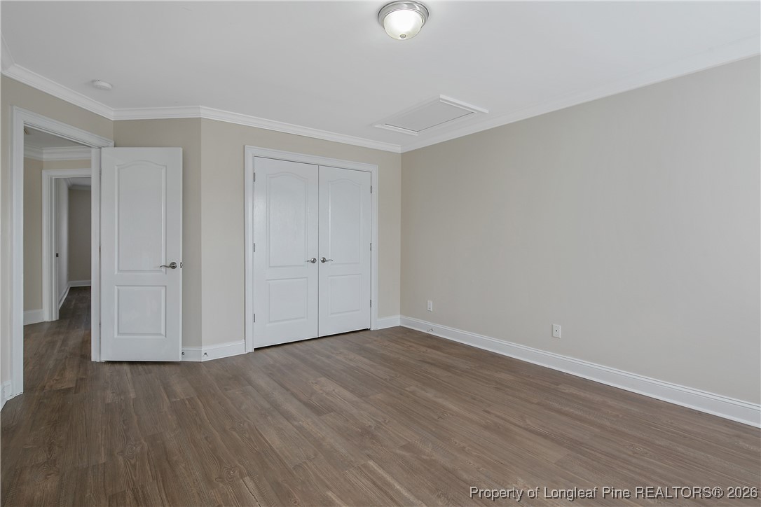 2721 Plum Ridge Road Fayetteville, NC 28306 - Photo 45 of 50 a view of an empty room with wooden floor