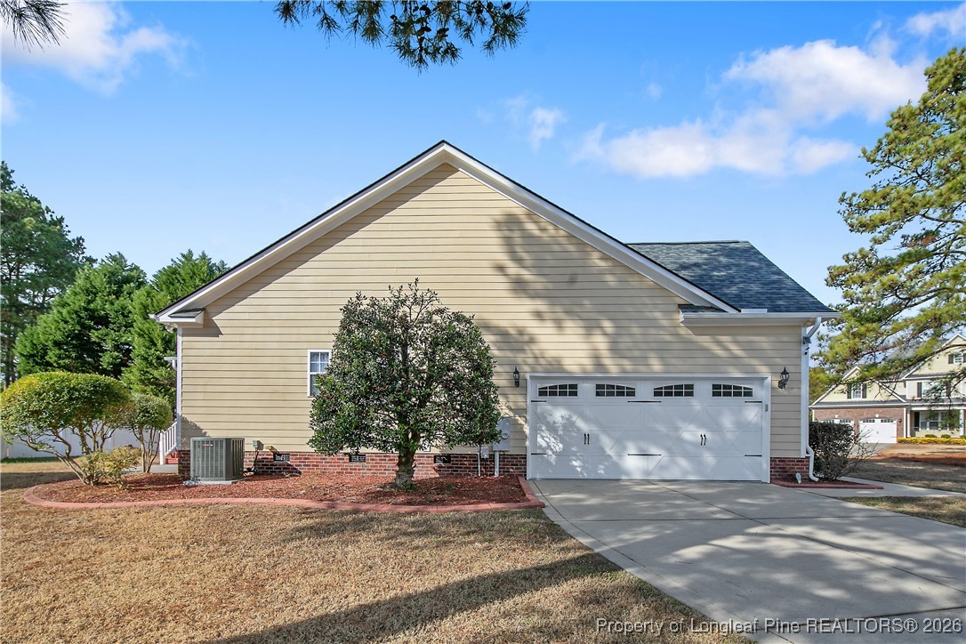 2721 Plum Ridge Road Fayetteville, NC 28306 - Photo 49 of 50 a view of a house with a patio