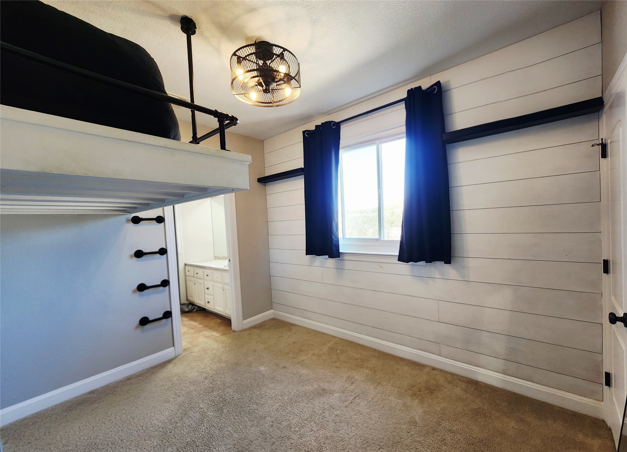 152 Silver Hawk Court Dripping Springs, TX 78620 - Photo 23 of 31 a view of a closet area with ceiling fan