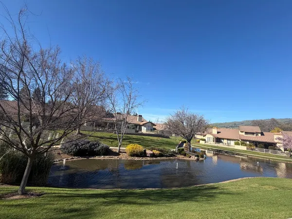 a view of a lake with houses