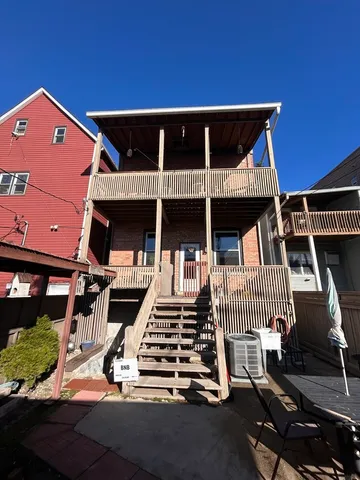 front view of a house with a street