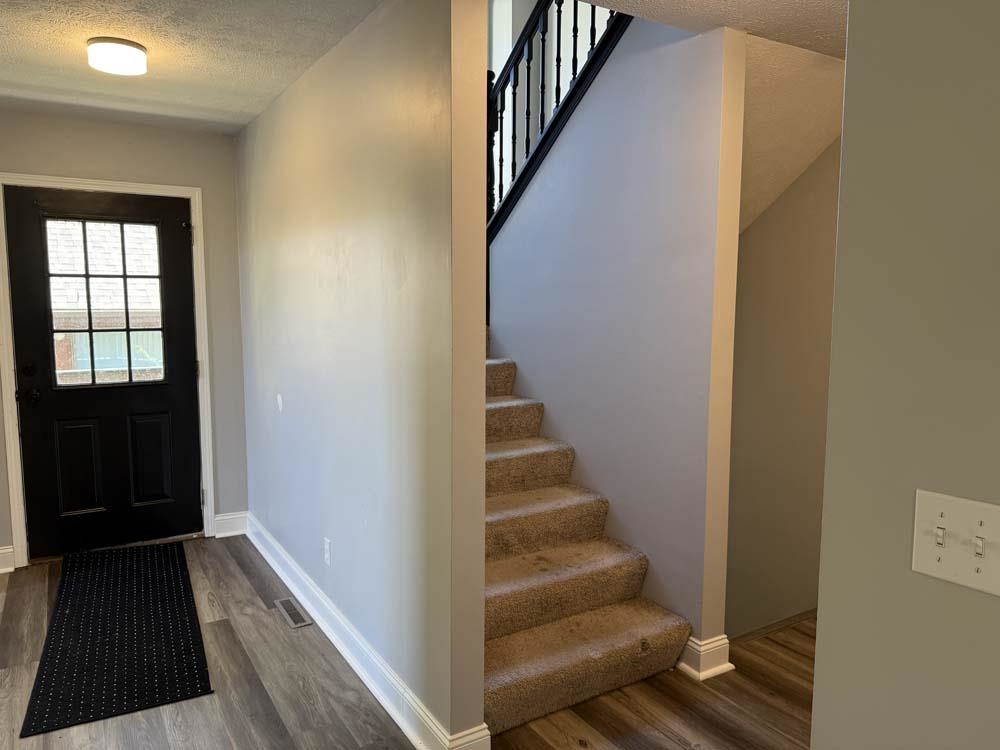 2179 Gainsboro Avenue Davis, IL 61019 - Photo 12 of 50 a view of a hallway with wooden floor and entryway