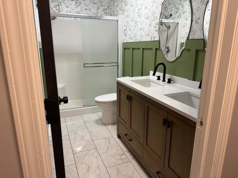 2179 Gainsboro Avenue Davis, IL 61019 - Photo 13 of 50 a bathroom with a sink and a mirror