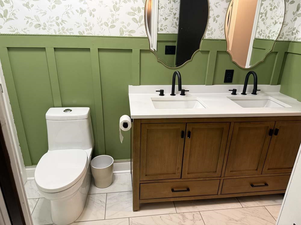 2179 Gainsboro Avenue Davis, IL 61019 - Photo 14 of 50 a bathroom with a toilet sink and mirror