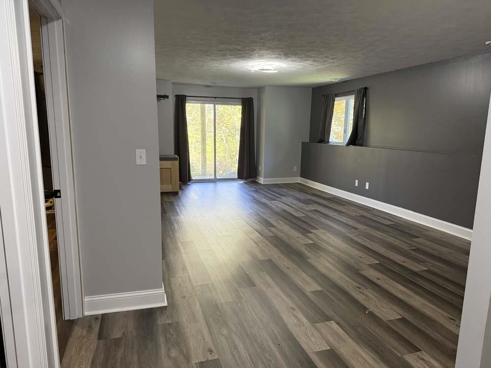 2179 Gainsboro Avenue Davis, IL 61019 - Photo 19 of 50 a view of an empty room with wooden floor and a window