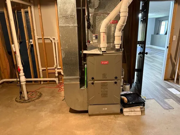 a bathroom with a sink toilet and mirror