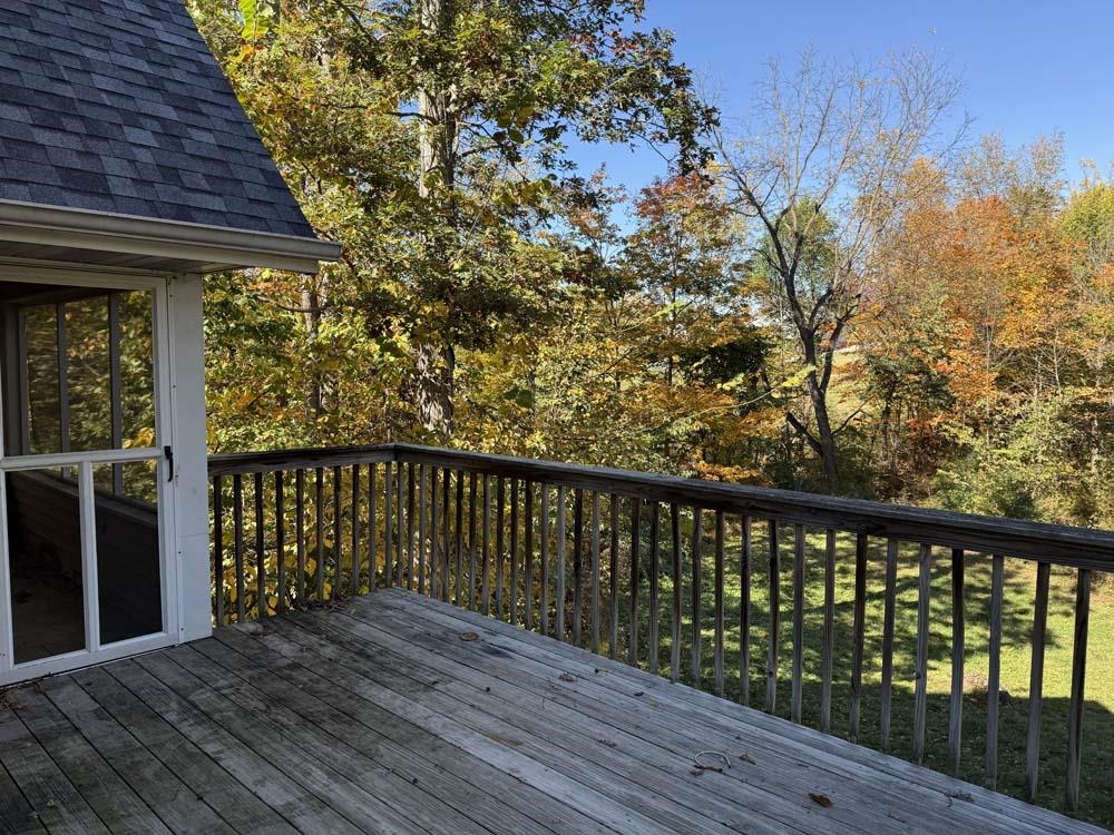 2179 Gainsboro Avenue Davis, IL 61019 - Photo 40 of 50 a balcony with wooden floor and fence