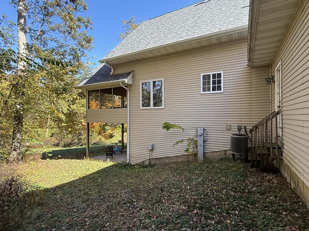 2179 Gainsboro Avenue Davis, IL 61019 - Photo 42 of 50 a view of a house with backyard and a tree