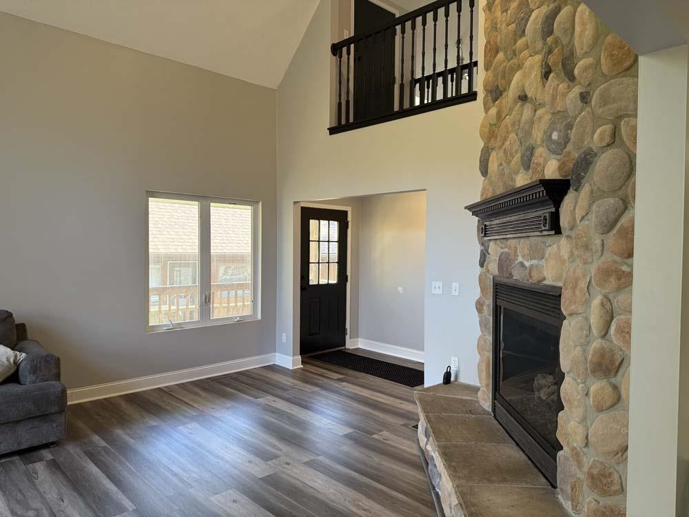 2179 Gainsboro Avenue Davis, IL 61019 - Photo 7 of 50 a view of an empty room with wooden floor and a window