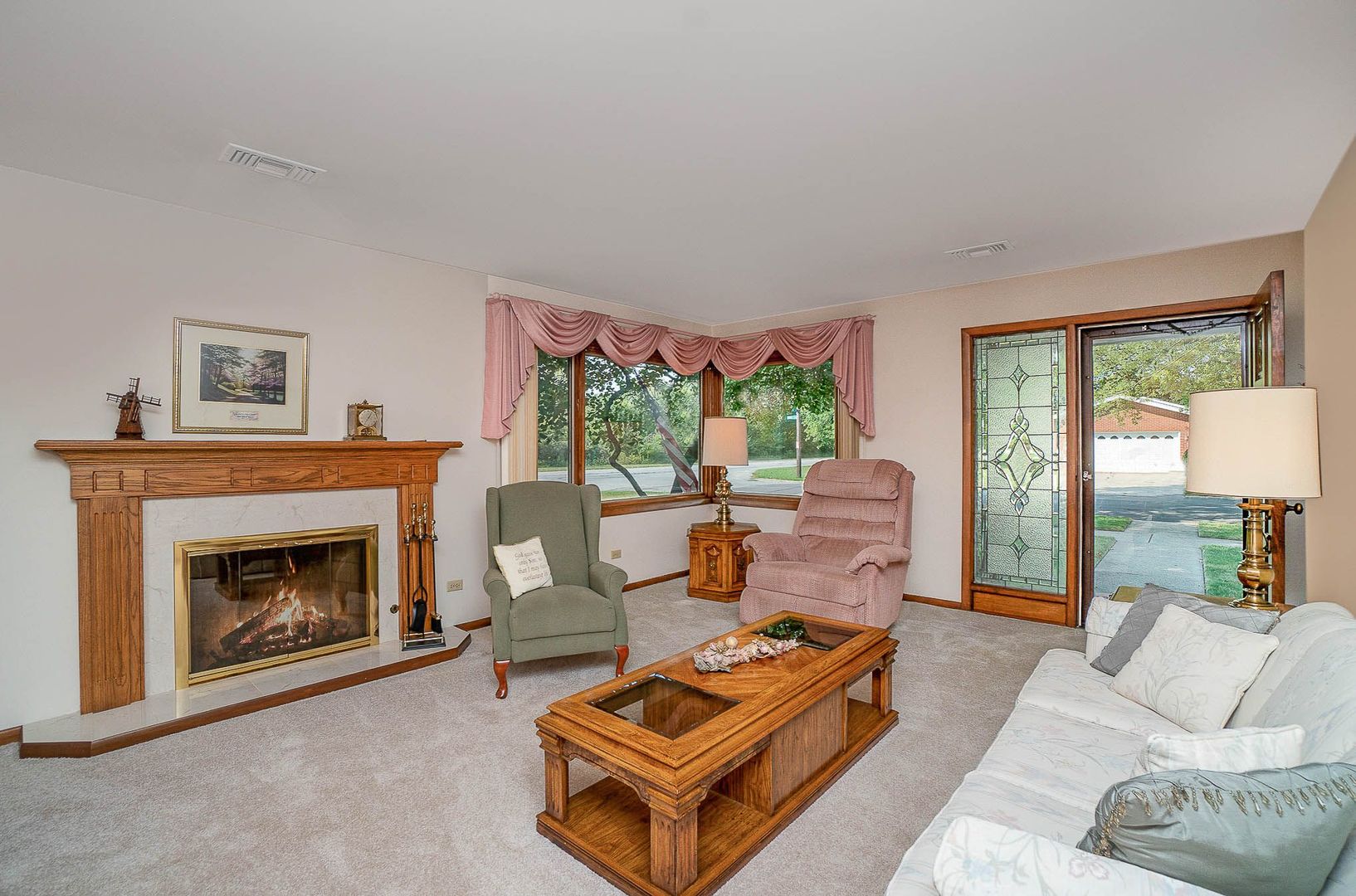 18561 Bock Road Lansing, IL 60438 - Photo 8 of 38 a living room with furniture and a fireplace
