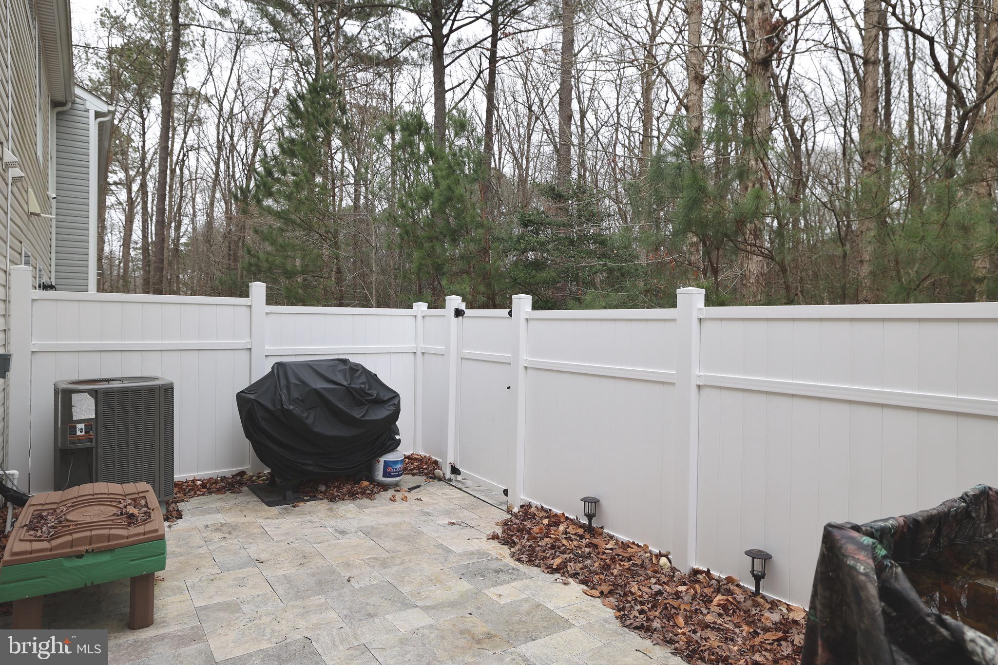 130 Intrepid Lane Berlin, MD 21811 - Photo 10 of 18 a view of a backyard with furniture