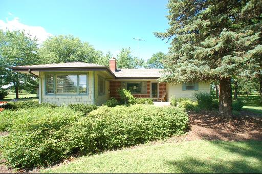 30 48w774 Route Big Rock, IL 60511 - Photo 1 of 16 front view of a house with a garden
