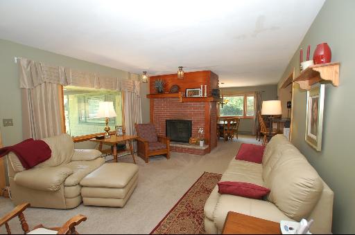 30 48w774 Route Big Rock, IL 60511 - Photo 2 of 16 a living room with furniture fireplace and a window