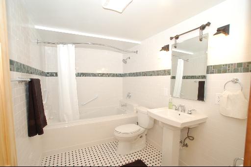 30 48w774 Route Big Rock, IL 60511 - Photo 12 of 16 a bathroom with a sink toilet a mirror and shower