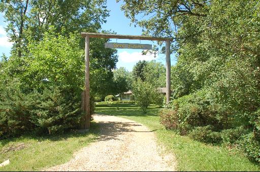 30 48w774 Route Big Rock, IL 60511 - Photo 14 of 16 a view of a yard with plants and large trees