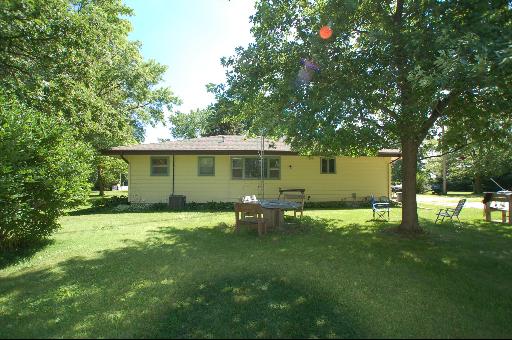 30 48w774 Route Big Rock, IL 60511 - Photo 15 of 16 a backyard of a house with table and chairs