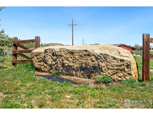 a view of a lake with houses in the back