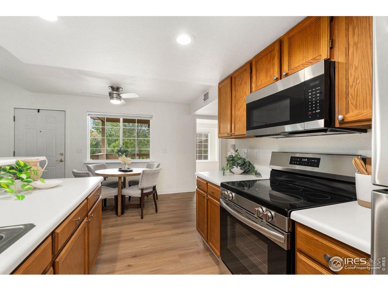 1225 West Prospect Road, Unit R47 Fort Collins, CO 80526 - Photo 12 of 25 Abundant counter space paired with generous cabinet storage.