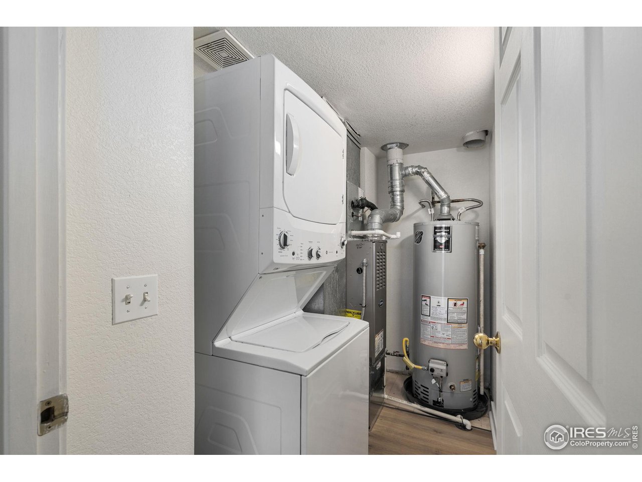 1225 West Prospect Road, Unit R47 Fort Collins, CO 80526 - Photo 21 of 25 A private laundry space makes daily living simple and efficient.