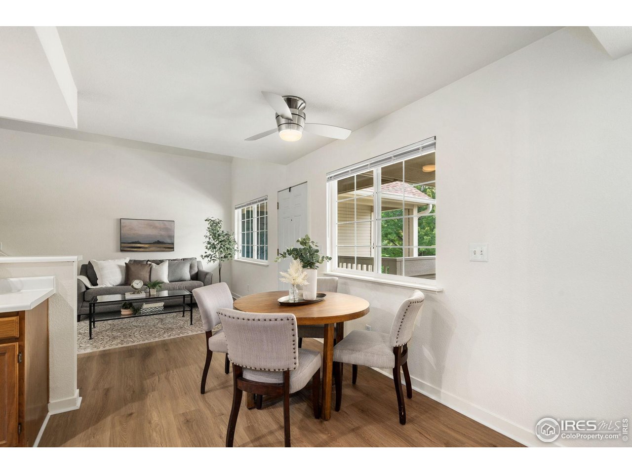 1225 West Prospect Road, Unit R47 Fort Collins, CO 80526 - Photo 8 of 25 Designed for modern living, the seamless flow into the dining area and kitchen creates a comfortable ease.