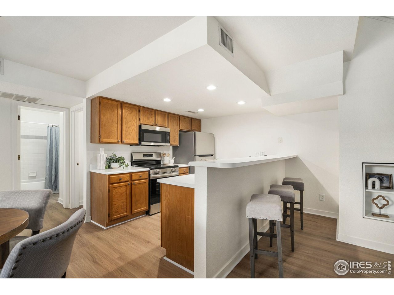 1225 West Prospect Road, Unit R47 Fort Collins, CO 80526 - Photo 10 of 25 Check out this kitchen! Additional bar seating for breakfast or for guests enjoying a drink.