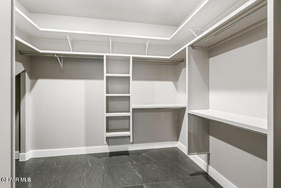7353 Cimarron Rim Road El Paso, TX 79911 - Photo 18 of 30 a view of an empty walk in closet
