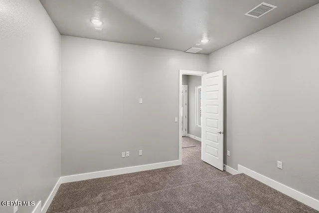an empty room with an entryway