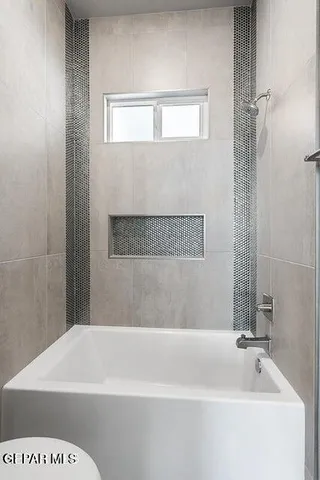 a bathroom with a bathtub