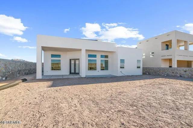 a view of a house with a patio