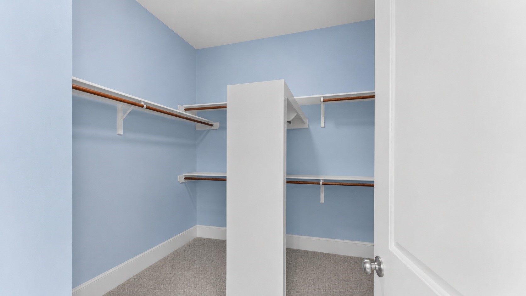 32001 Birch Briar Court Spring, TX 77386 - Photo 27 of 48 One of two large walk-in primary closets with custom shelving, multiple hanging areas, and exceptional storage for every wardrobe.