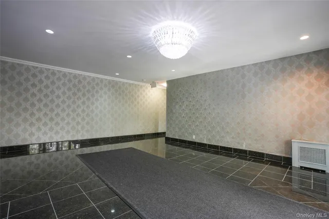 an empty room with wooden floor