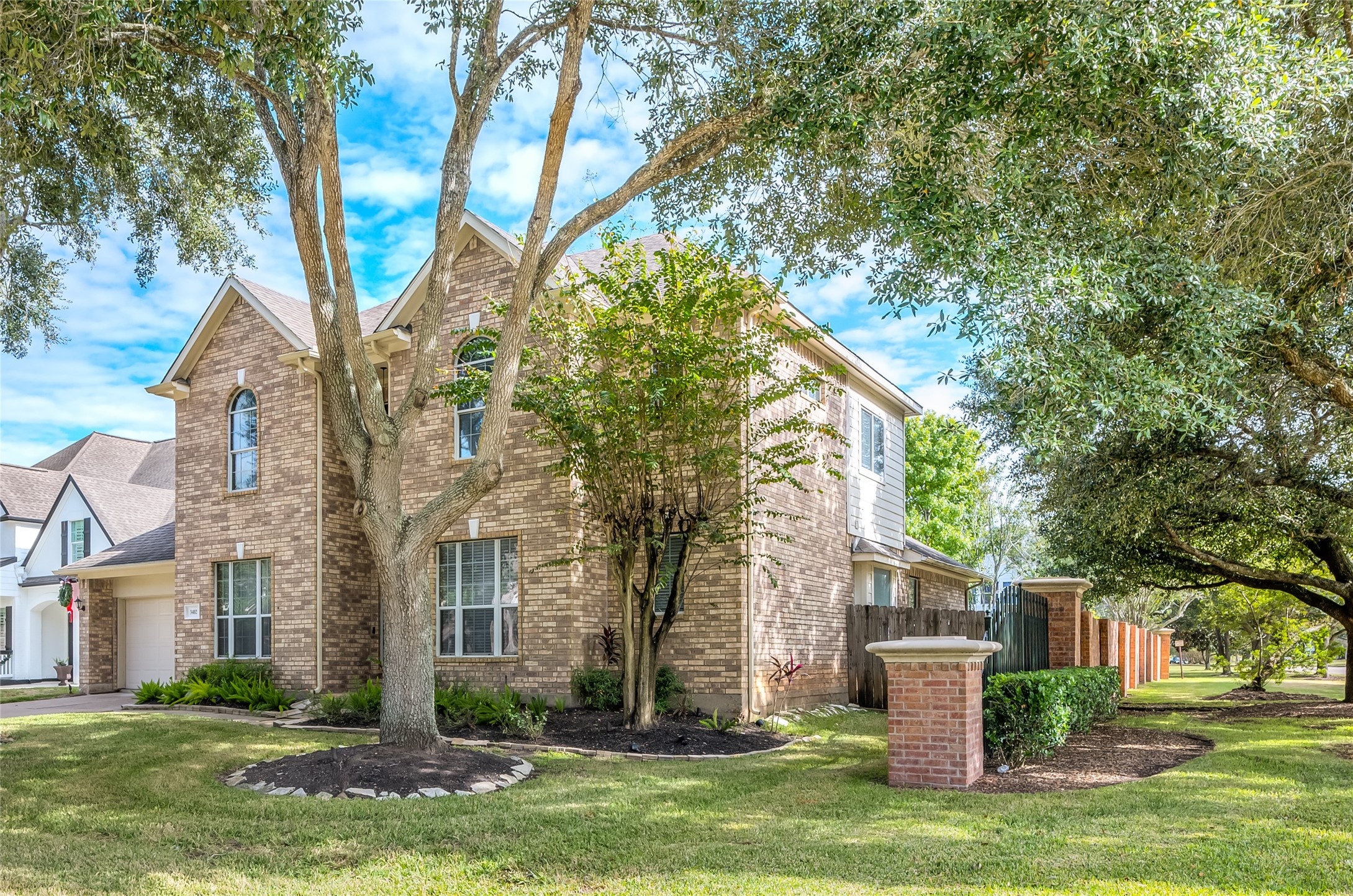 3402 Caloway Court Missouri City, TX 77459 - Photo 30 of 31 a white house that has a tree in front of it