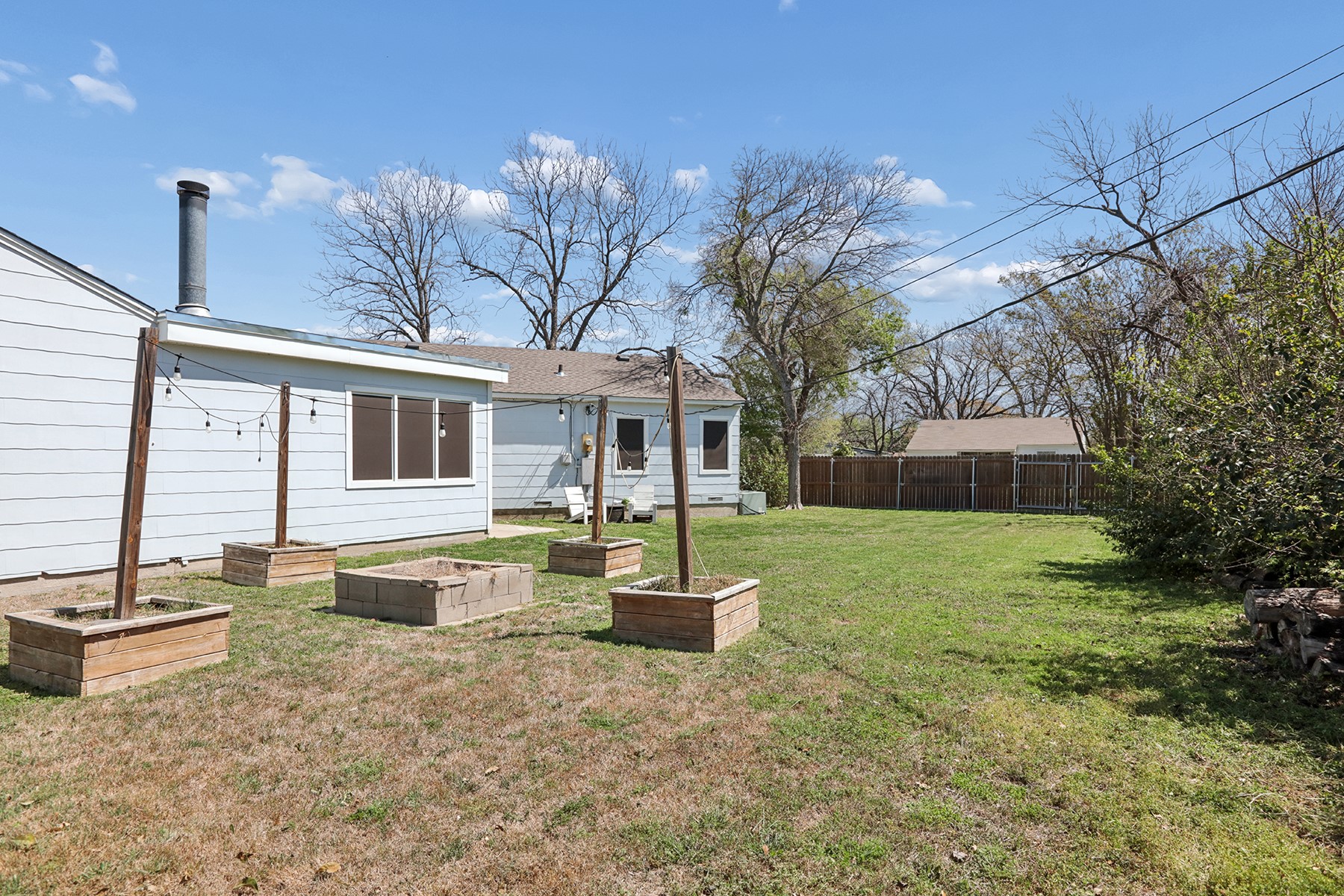 2210 Monticello Road Temple, TX 76501 - Photo 11 of 34 Rear view of property with a garden