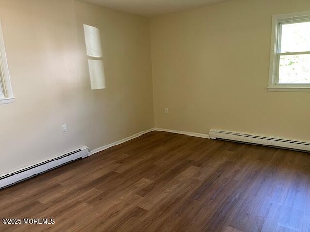 57 Heather Narrows Toms River, NJ 08755 - Photo 11 of 17 an empty room with wooden floor and windows