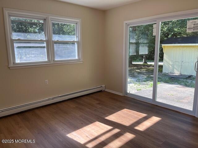 57 Heather Narrows Toms River, NJ 08755 - Photo 13 of 17 a view of an empty room with wooden floor and a window