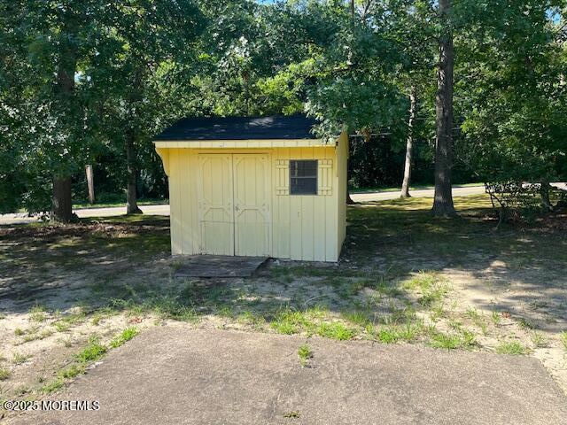 57 Heather Narrows Toms River, NJ 08755 - Photo 16 of 17 a view of a backyard with large tree