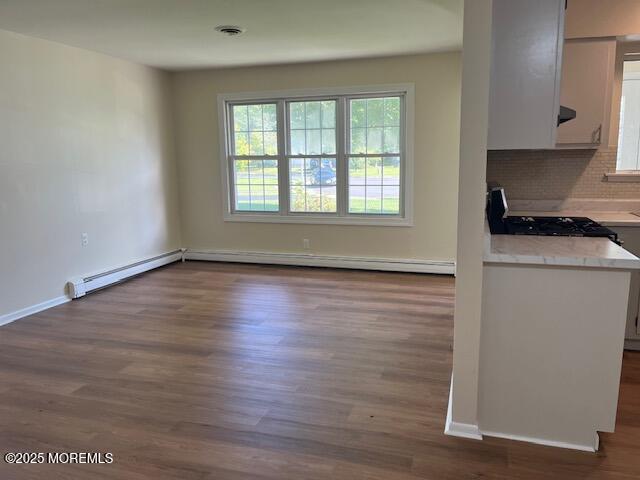 57 Heather Narrows Toms River, NJ 08755 - Photo 5 of 17 an empty room with wooden floor and a window
