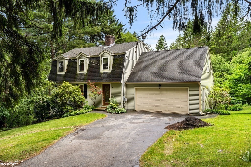 82 Curtis Street Auburn, MA 01501 - Photo 2 of 35 a front view of a house with a yard