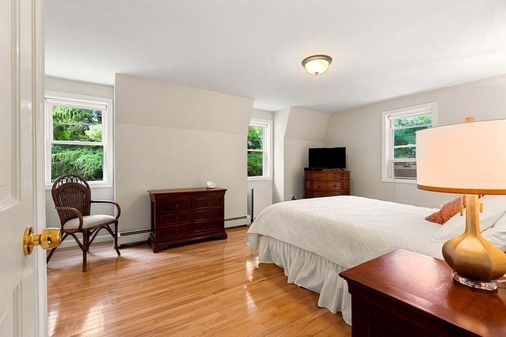 82 Curtis Street Auburn, MA 01501 - Photo 26 of 35 a bedroom with furniture and a window