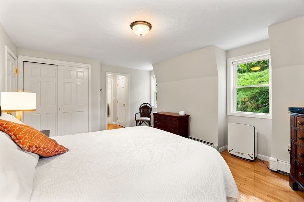 82 Curtis Street Auburn, MA 01501 - Photo 28 of 35 a bedroom with a bed and a window