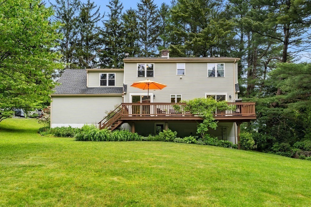 82 Curtis Street Auburn, MA 01501 - Photo 30 of 35 a house view with a garden space
