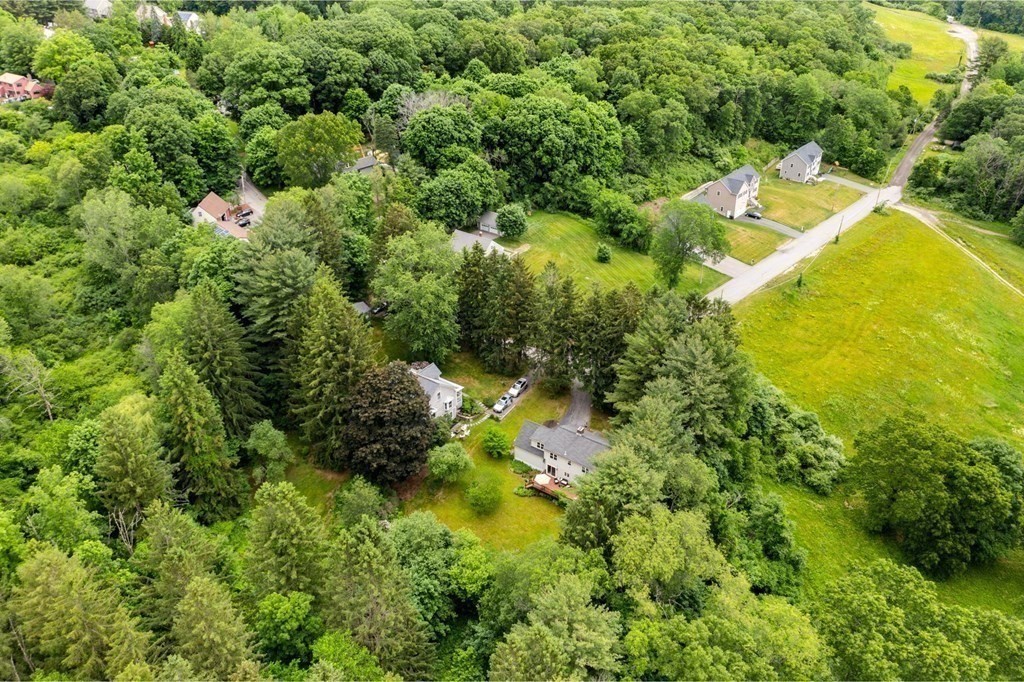 82 Curtis Street Auburn, MA 01501 - Photo 32 of 35 an aerial view of residential house with swimming pool and green space