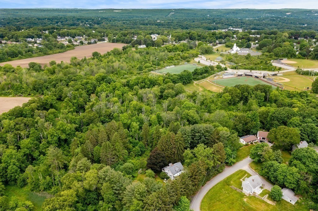 82 Curtis Street Auburn, MA 01501 - Photo 33 of 35 an aerial view of residential houses with outdoor space and river