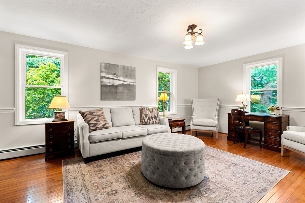 82 Curtis Street Auburn, MA 01501 - Photo 7 of 35 a living room with furniture and a large window