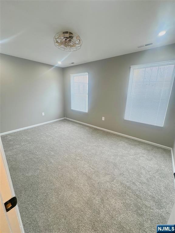 239 40th, Unit 7 Irvington, NJ 07111 - Photo 8 of 8 an empty room with a window