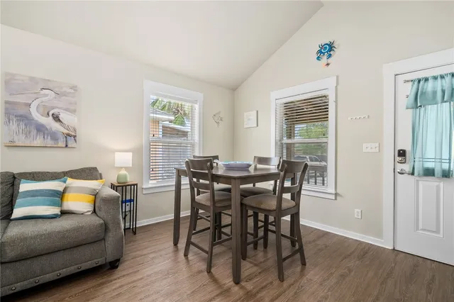 a view of a livingroom with furniture and wooden floor