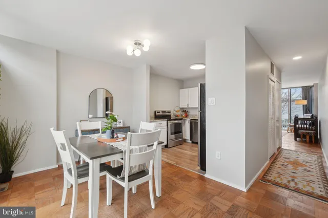 a view of a dining room with furniture