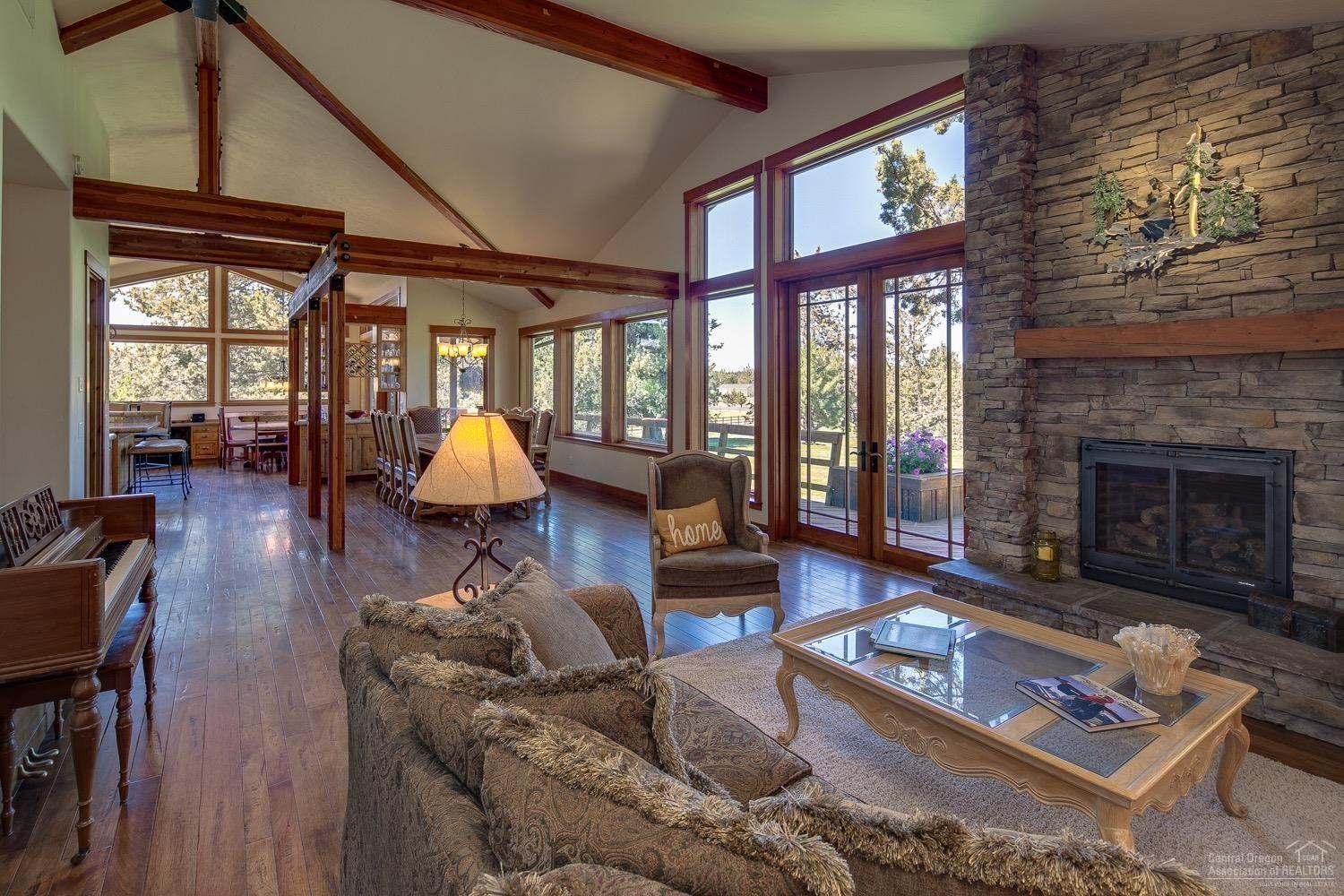 62336 Deer Trail Road Bend, OR 97701 - Photo 3 of 24 Vaulted open beam ceilings set this room