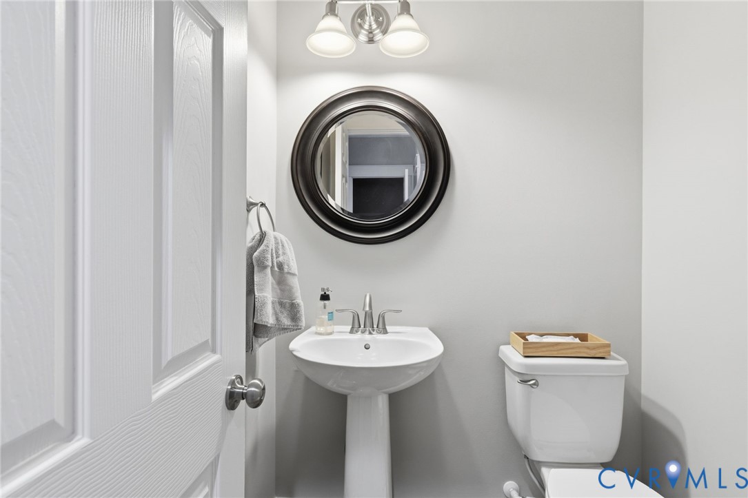 4001 Bircham Loop Midlothian, VA 23113 - Photo 21 of 33 a bathroom with a toilet a sink and a mirror